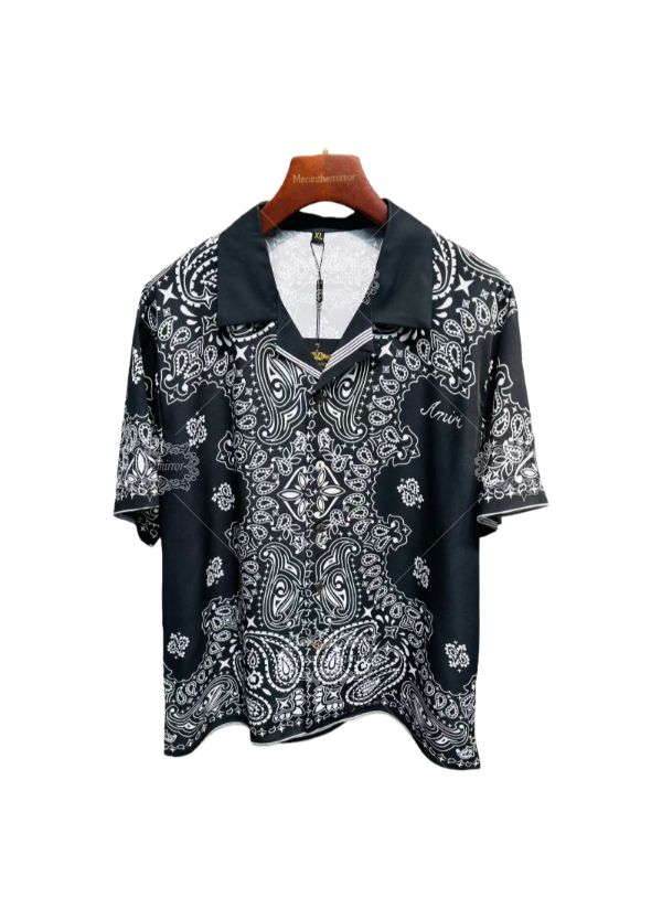 เสื้อยืดตราสัญลักษณ์สีดำ | เดอะ แกลเลอรี ลักซ์