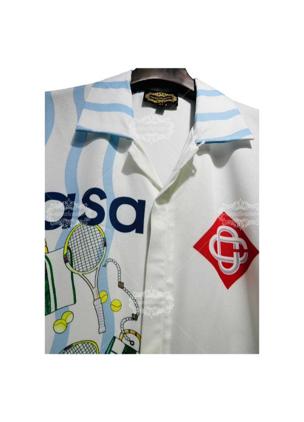 เสื้อเชิ้ตพิมพ์ลายเทนนิสลายคลื่นสีขาวและสีฟ้า | สปอร์ตลักซ์รีสอร์ท ลอง
