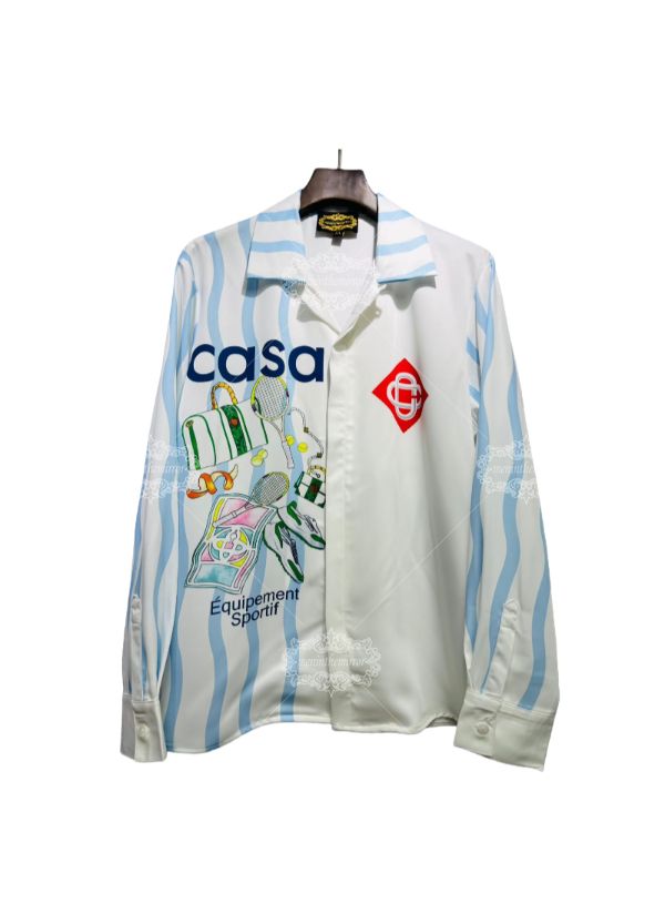 เสื้อเชิ้ตพิมพ์ลายเทนนิสลายคลื่นสีขาวและสีฟ้า | สปอร์ตลักซ์รีสอร์ท ลอง