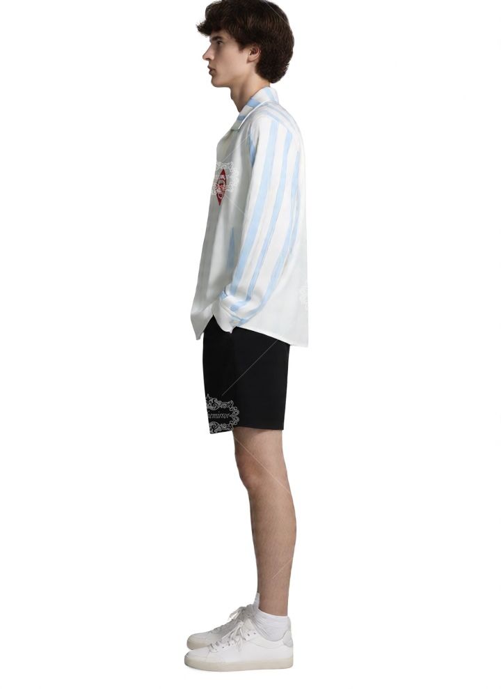 เสื้อเชิ้ตพิมพ์ลายเทนนิสลายคลื่นสีขาวและสีฟ้า | สปอร์ตลักซ์รีสอร์ท ลอง